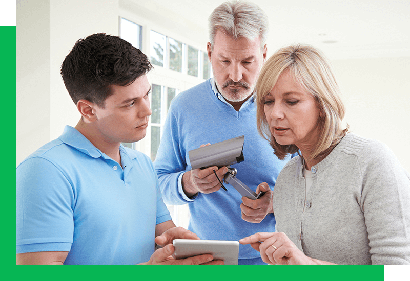 image of a couple getting trained on alarm systems