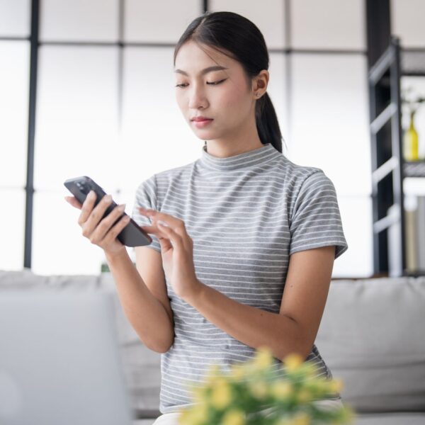 girl looking at her phone