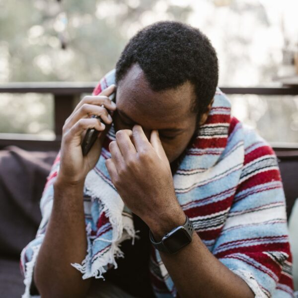 stressed man on the phone